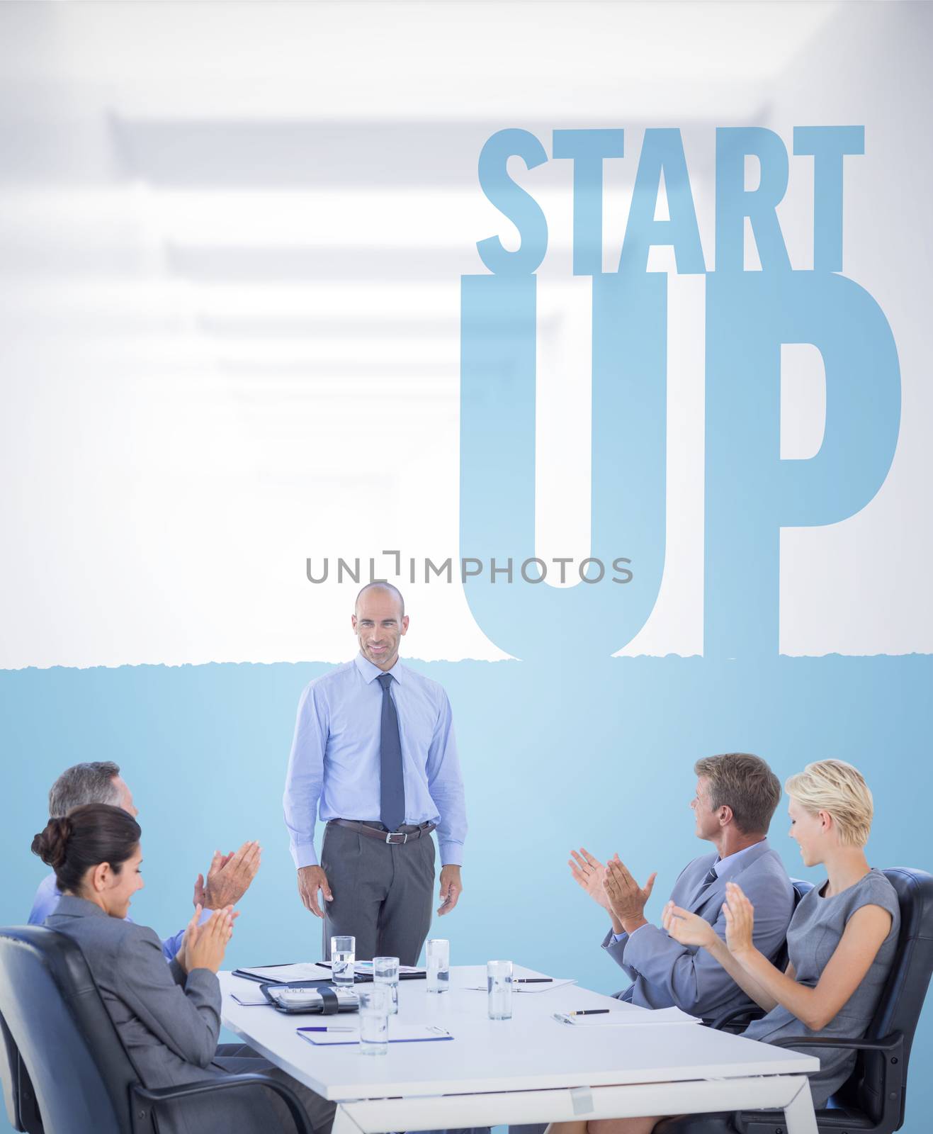 Composite image of business people applauding during meeting  by Wavebreakmedia
