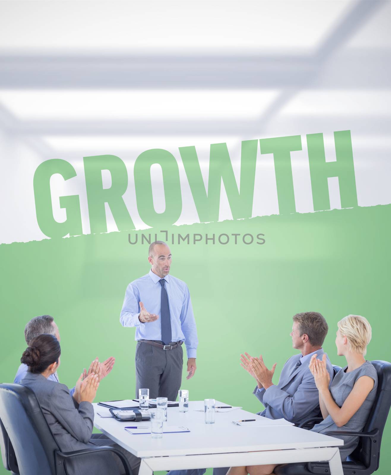 Composite image of business people applauding during meeting  by Wavebreakmedia