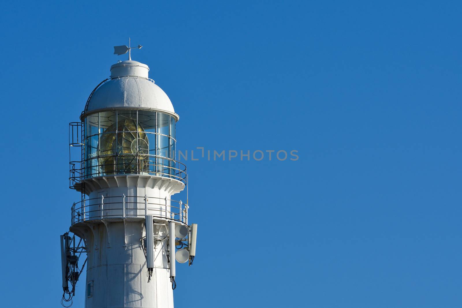 Large Torch Light On Slangkop Lighthouse Tower by jjvanginkel