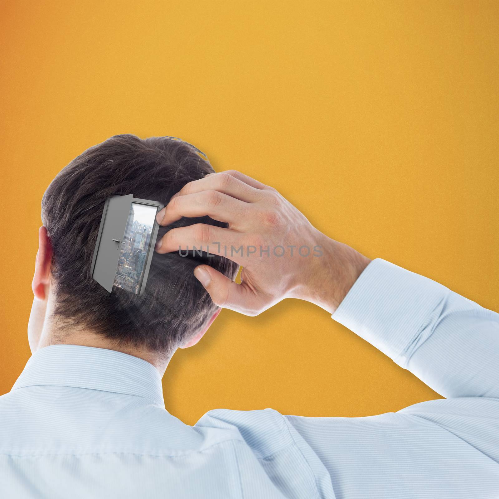 Businessman scratching his head against orange background