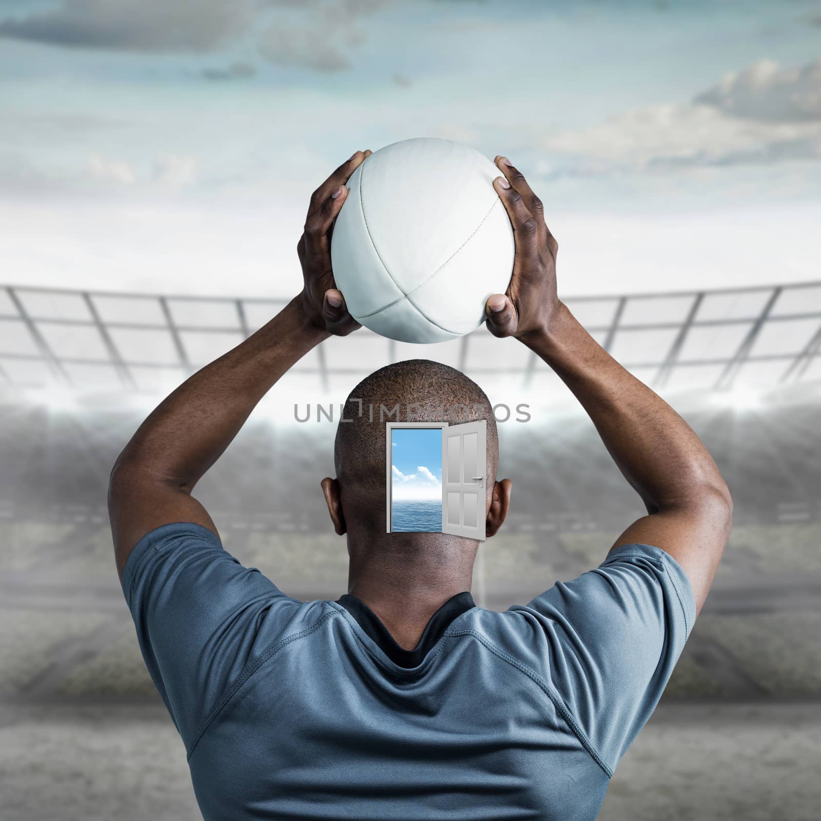 Composite image of rear view of athlete throwing rugby ball by Wavebreakmedia