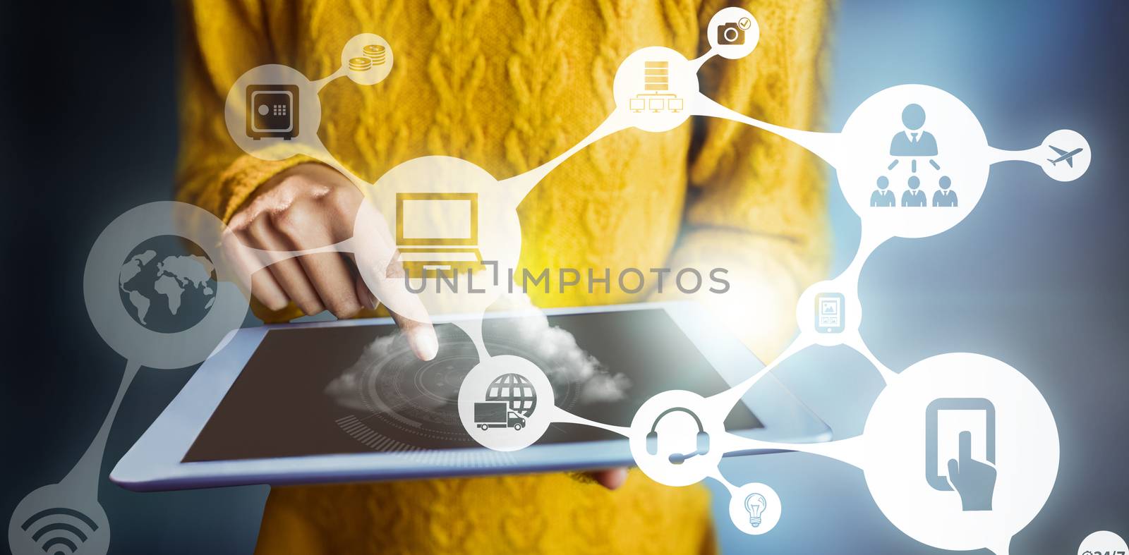 Composite image of focused asian woman using tablet by Wavebreakmedia