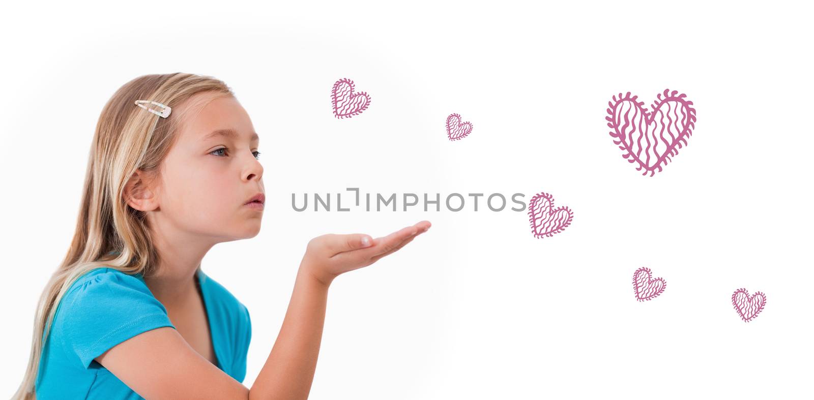Red Hearts against a child blowing a kiss air