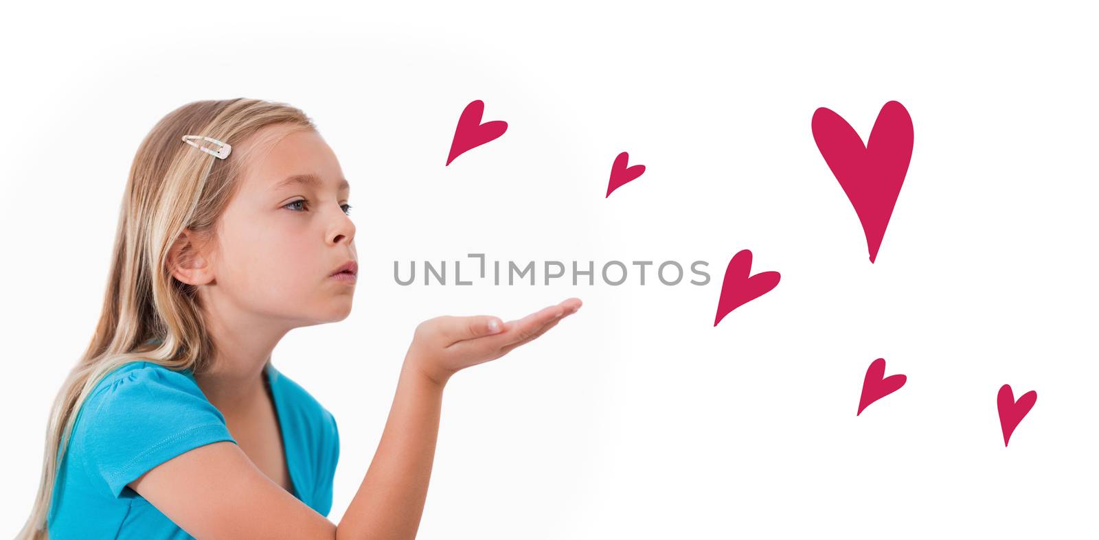 Red Hearts against a child blowing a kiss air