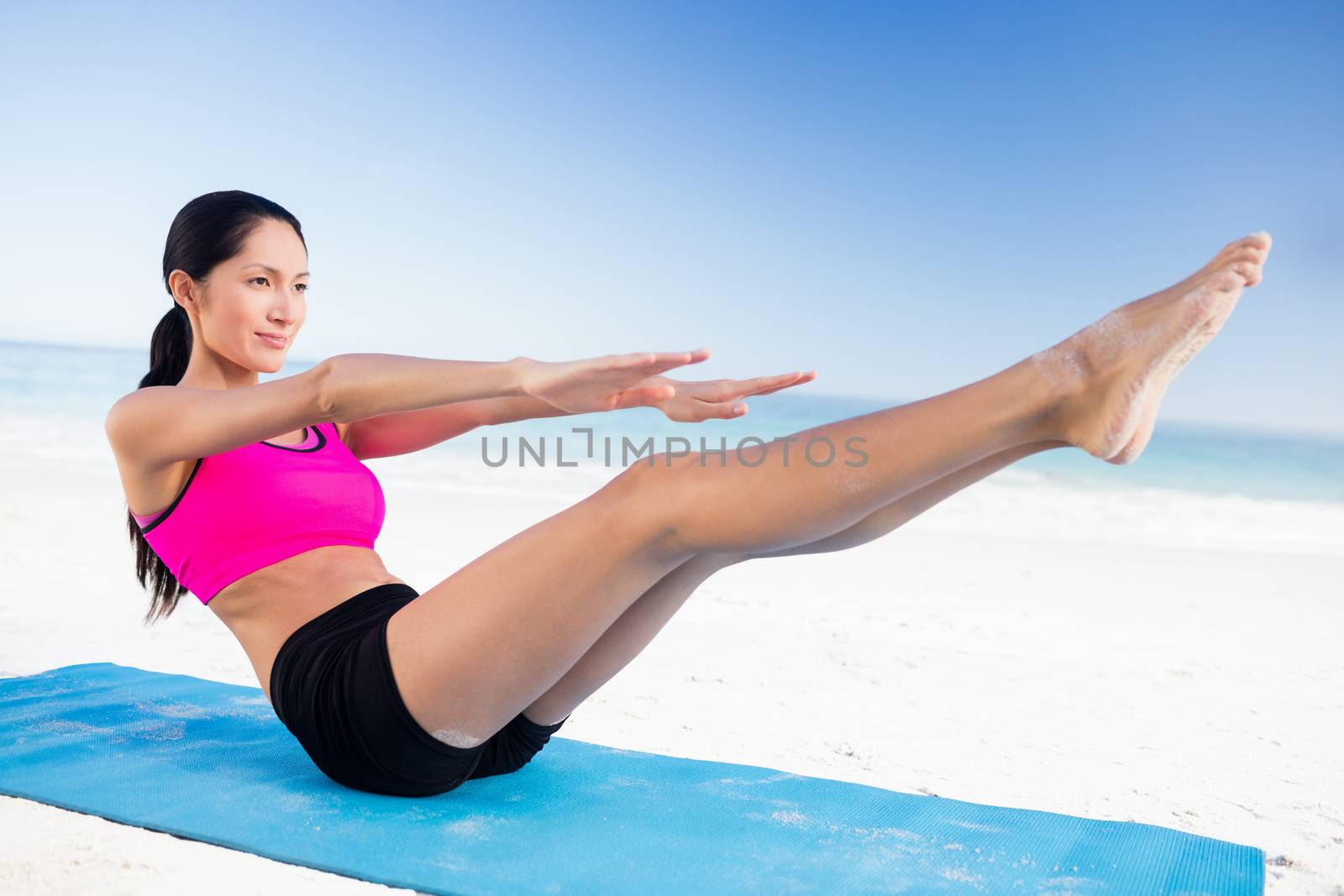  Fit woman doing yoga  by Wavebreakmedia