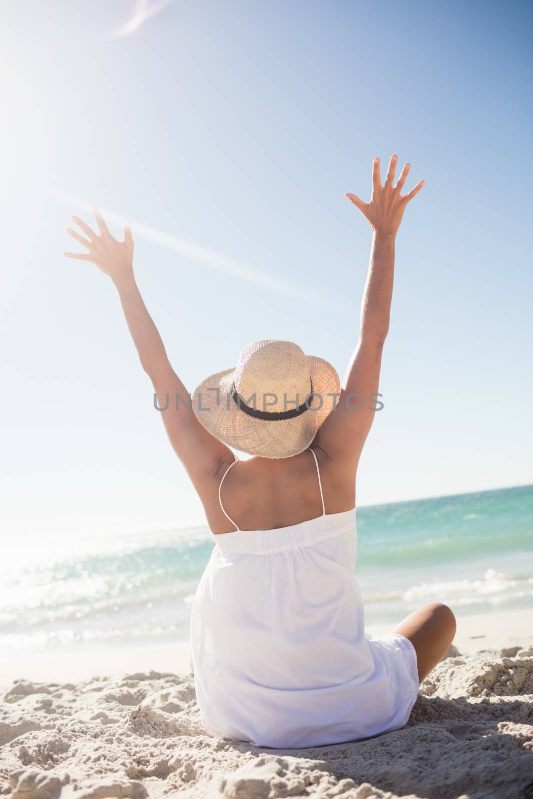 Happy woman having fun on the beach