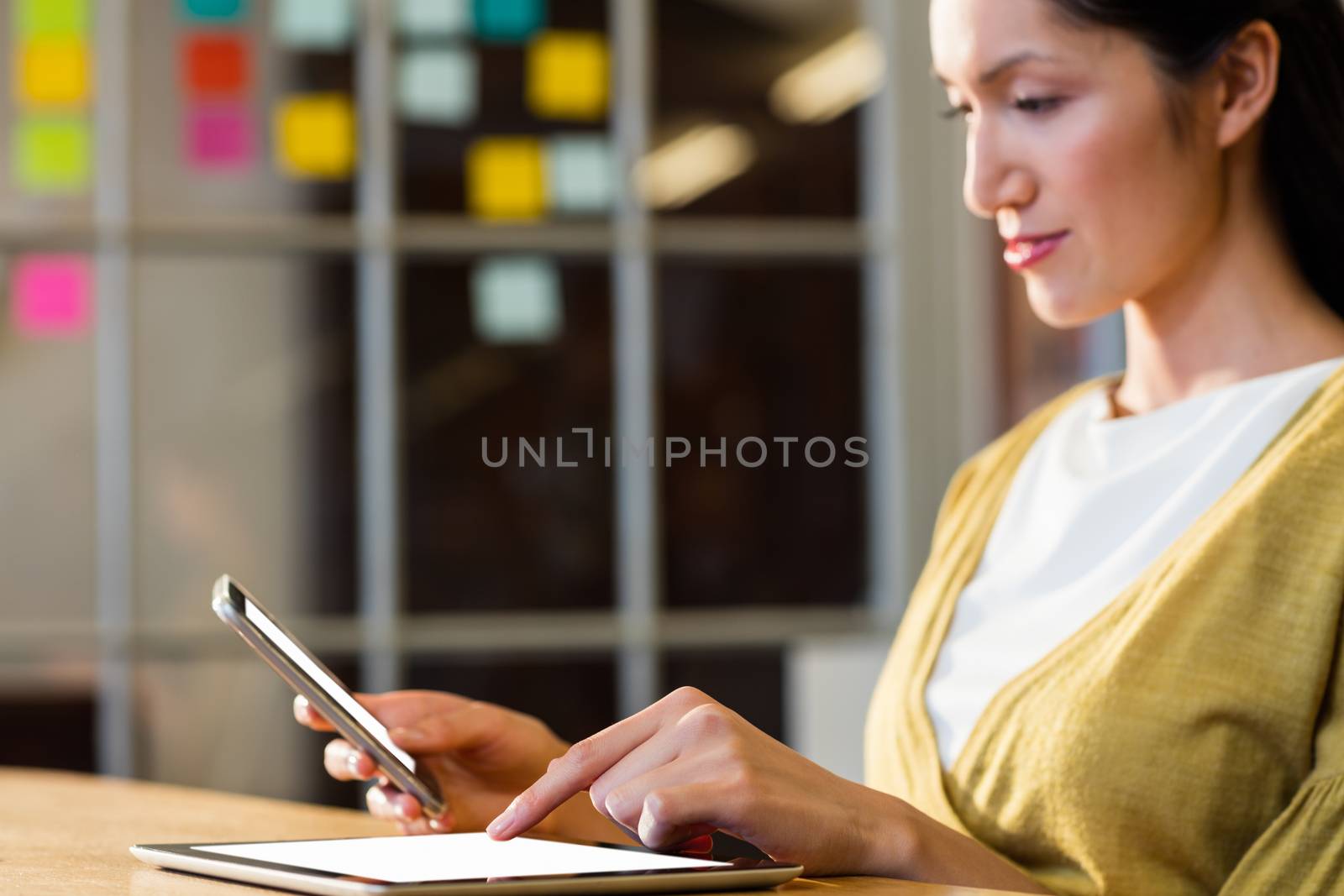 Businesswoman using technology in the office