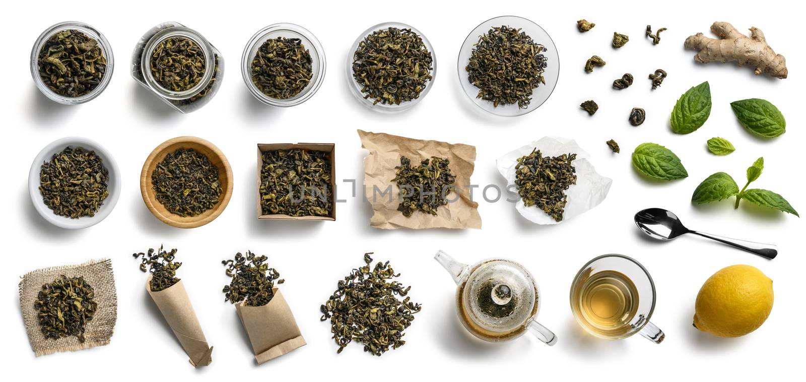 Green tea and accessories top view on white background by butenkow