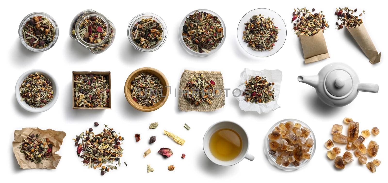 Herbal tea and accessories top view on white background by butenkow