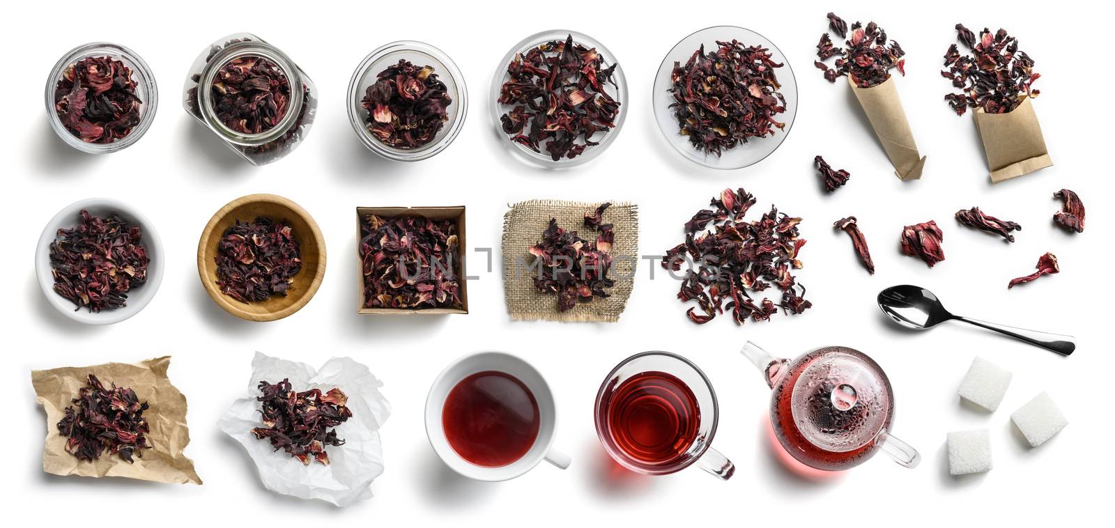 Hibiscus tea and accessories top view on white background by butenkow