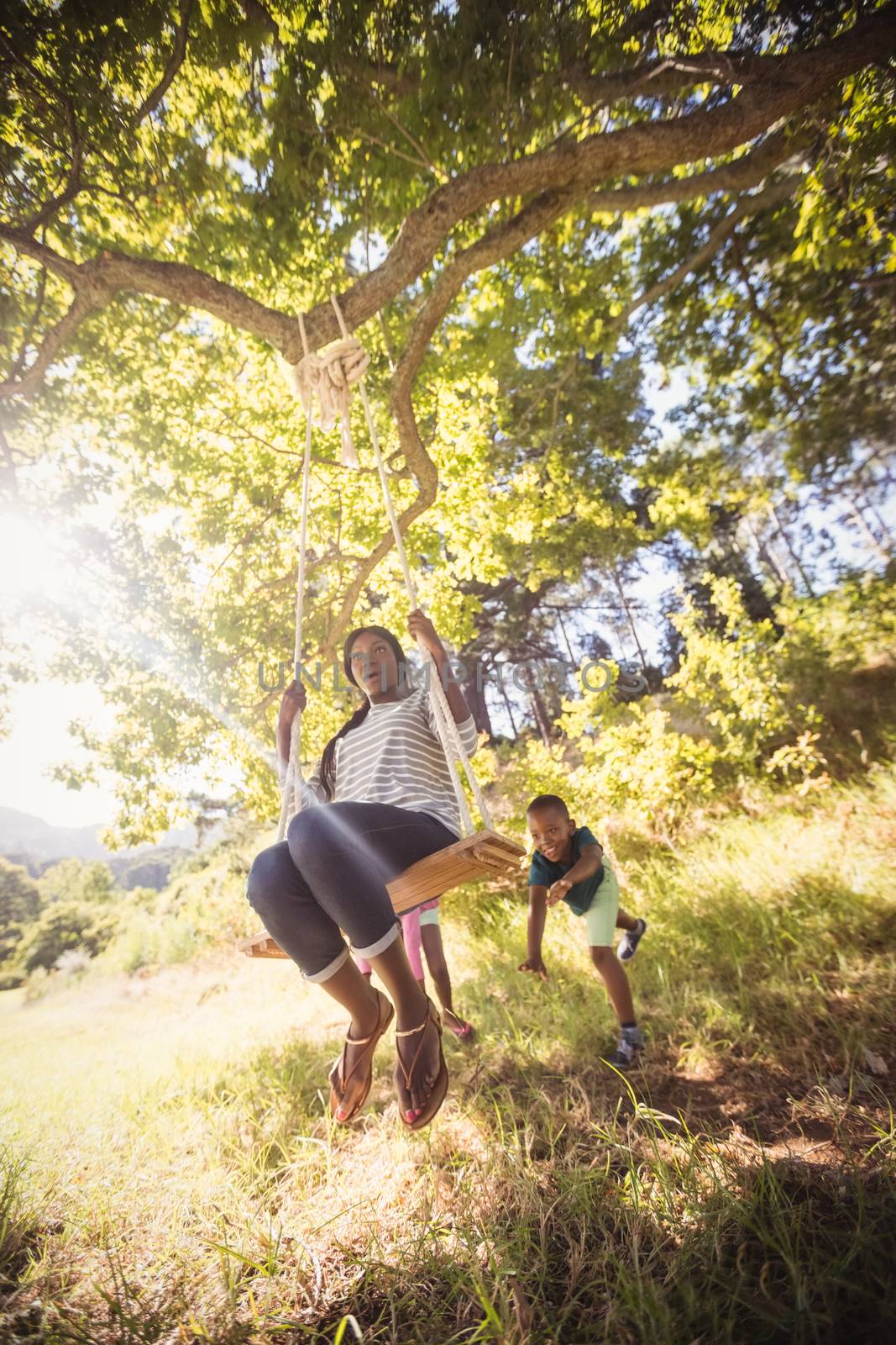 Happy family enjoying together at park