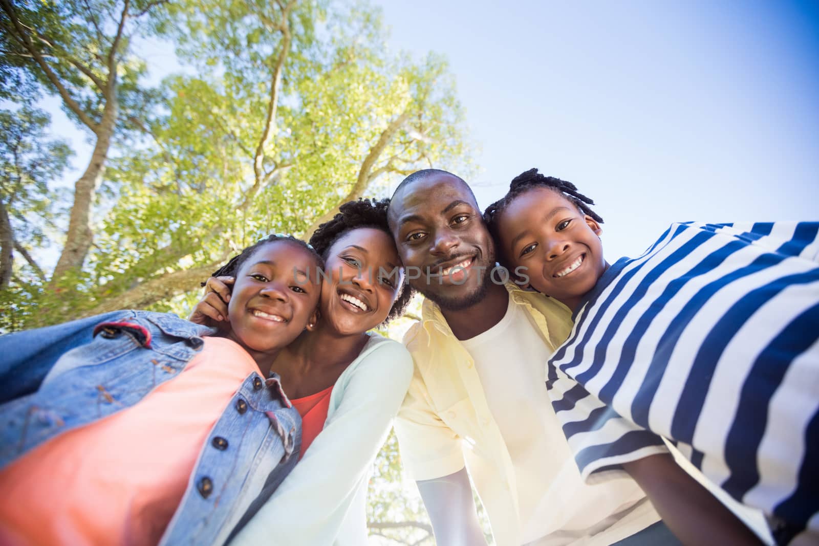 happy family posing together by Wavebreakmedia