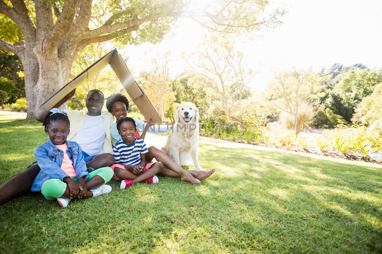 Happy family posing together by Wavebreakmedia