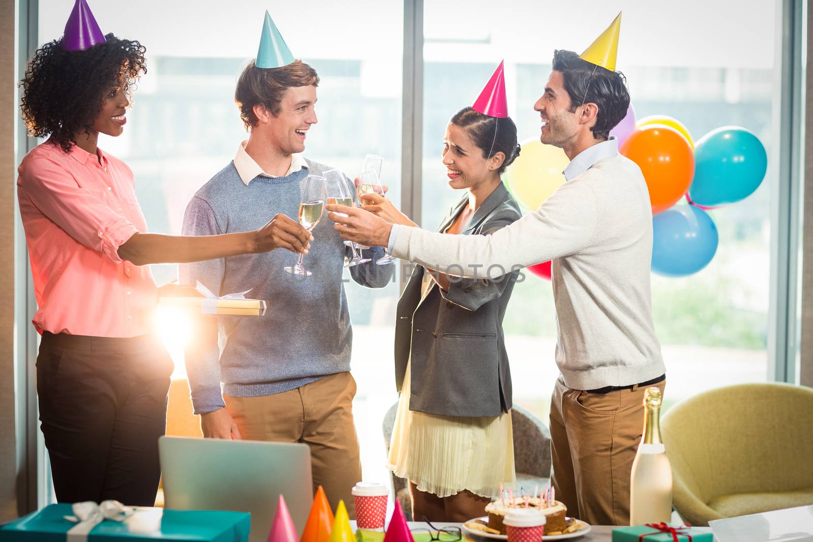 Business people celebrating birthday by Wavebreakmedia