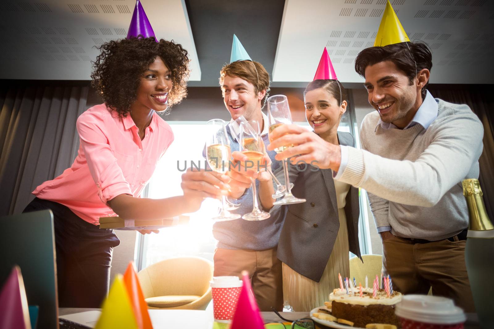 Business people celebrating birthday by Wavebreakmedia