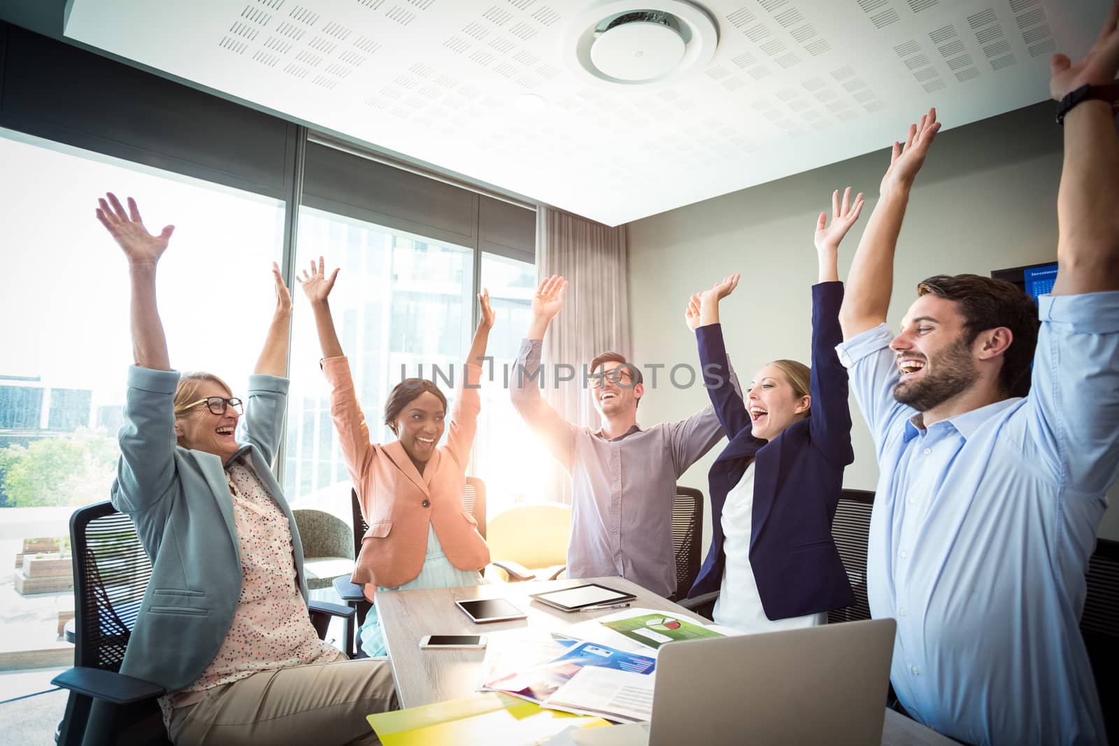 Business people raising their arms by Wavebreakmedia
