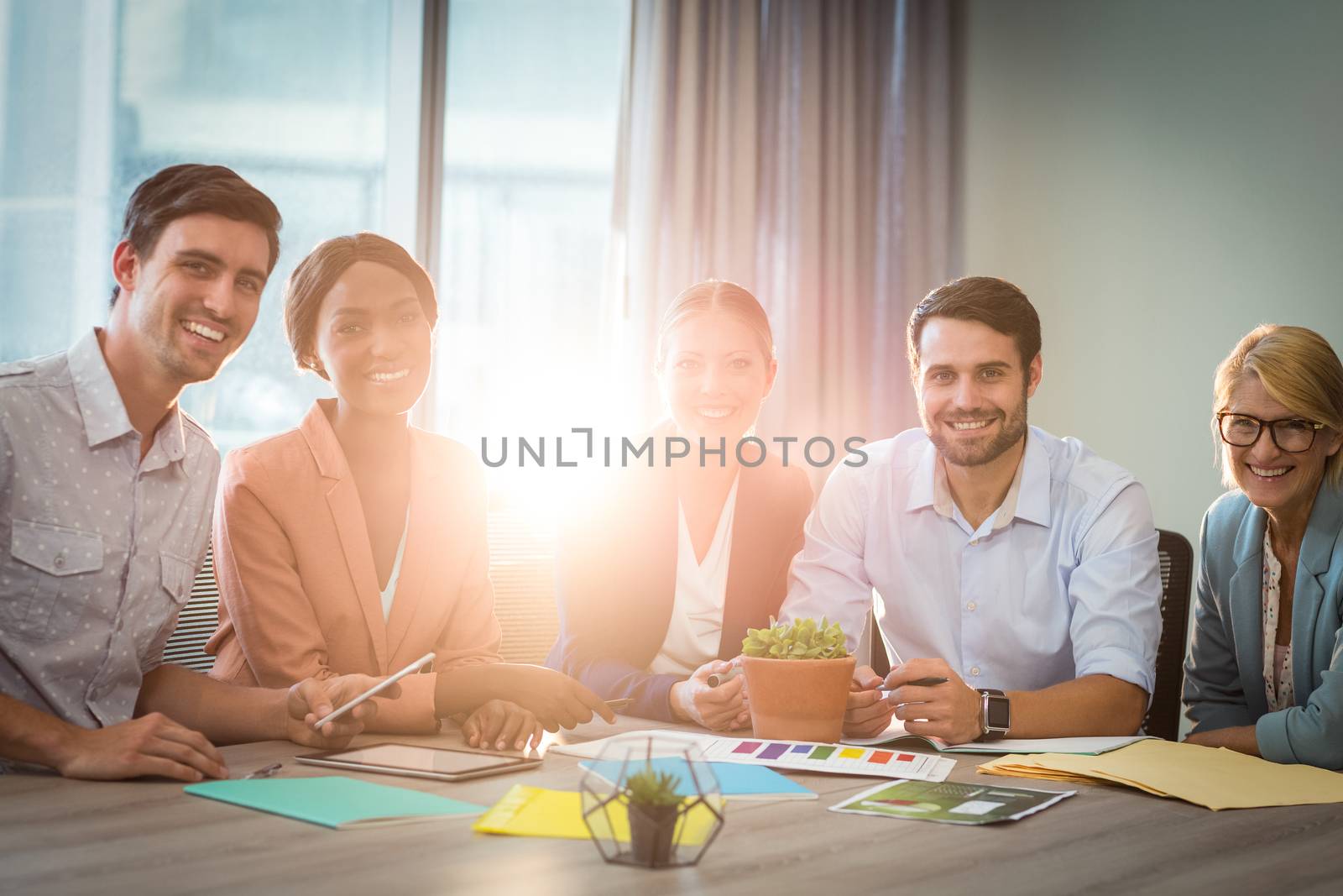 Business people discussing at desk by Wavebreakmedia