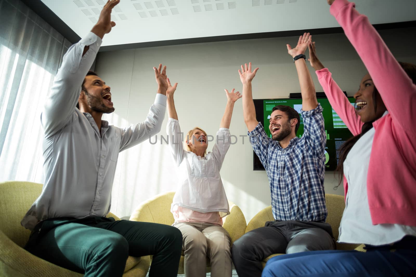 Business people raising their arms by Wavebreakmedia