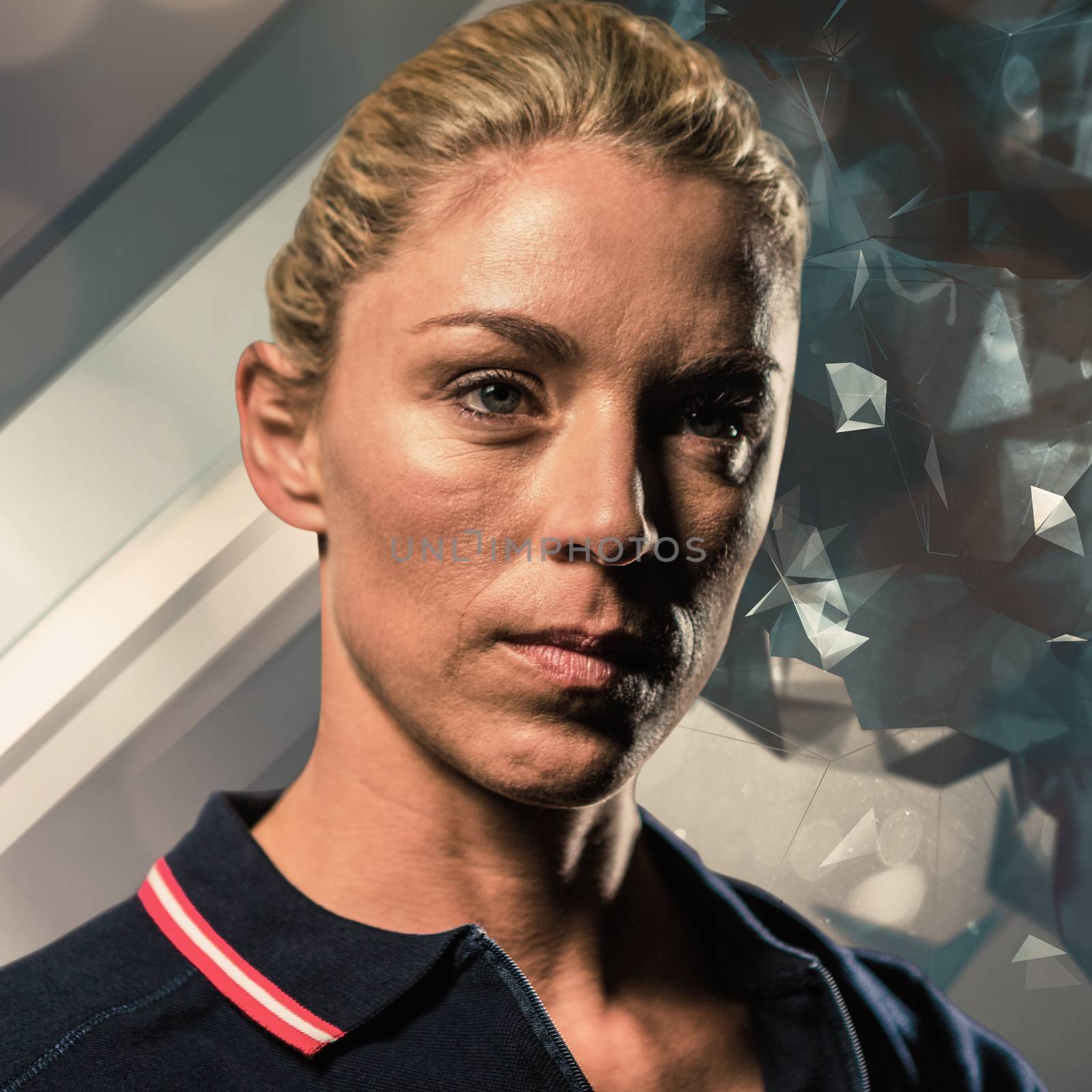 Close-up of female tennis player against angular design