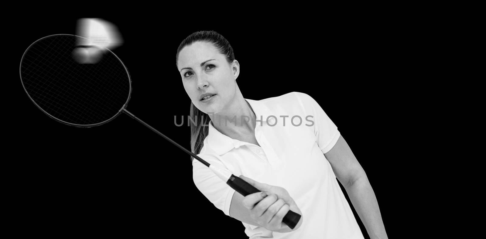 Female player playing badminton on white background