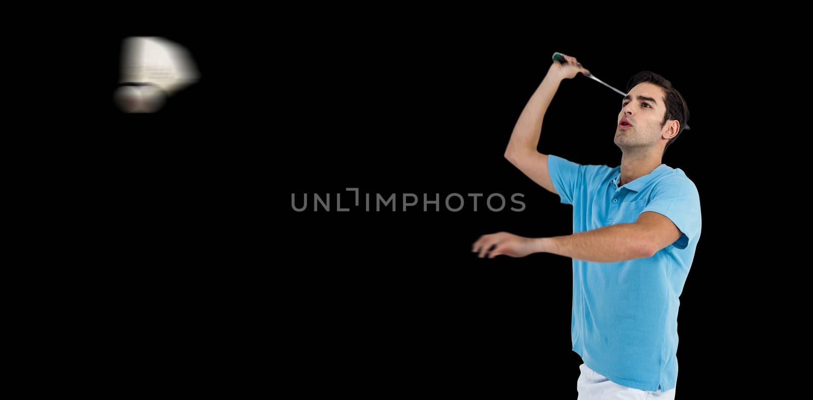 Badminton player playing badminton on white background