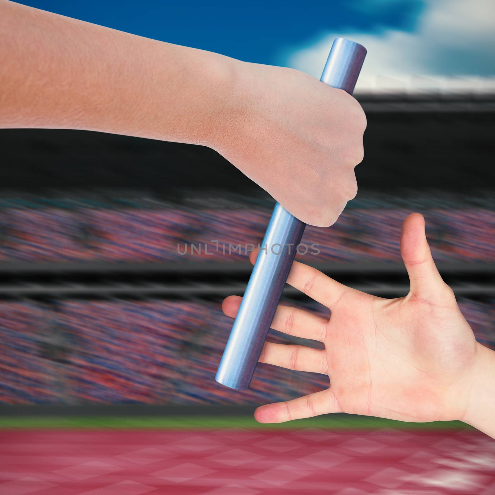 Close up of sportsman is holding a baton for a relay race 