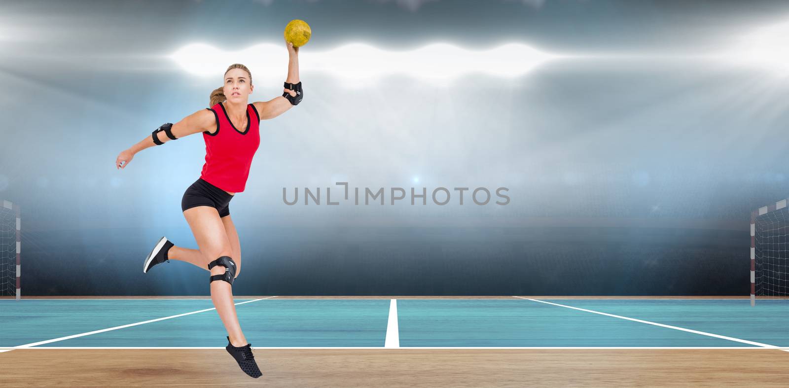 Female athlete with elbow pad throwing handball  by Wavebreakmedia
