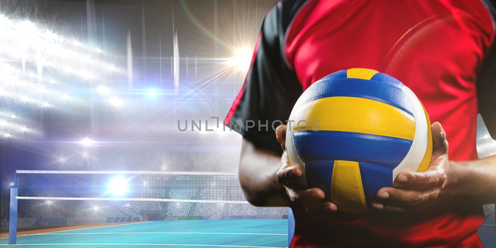 Composite image of mid-section of sportsman holding a volleyball by Wavebreakmedia