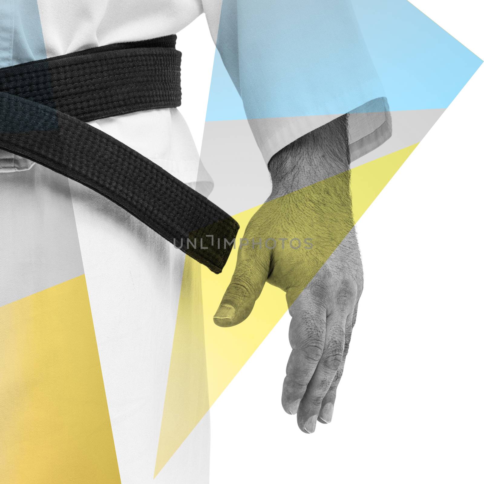 Close-up of karate black belt on white uniform against colored background
