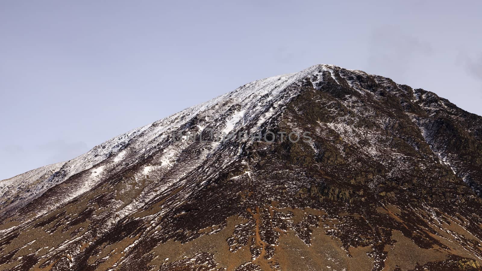 Grassmoor, a snow capped mountain in the English Lake District national park.