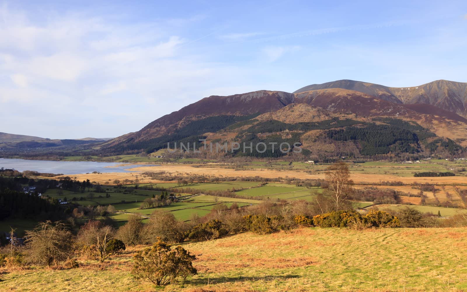A view of Bassenthwaite lake in the English Lake District national park with Skiddaw mountain in the background.  Skiddaw is the fourth highest mountain in England.