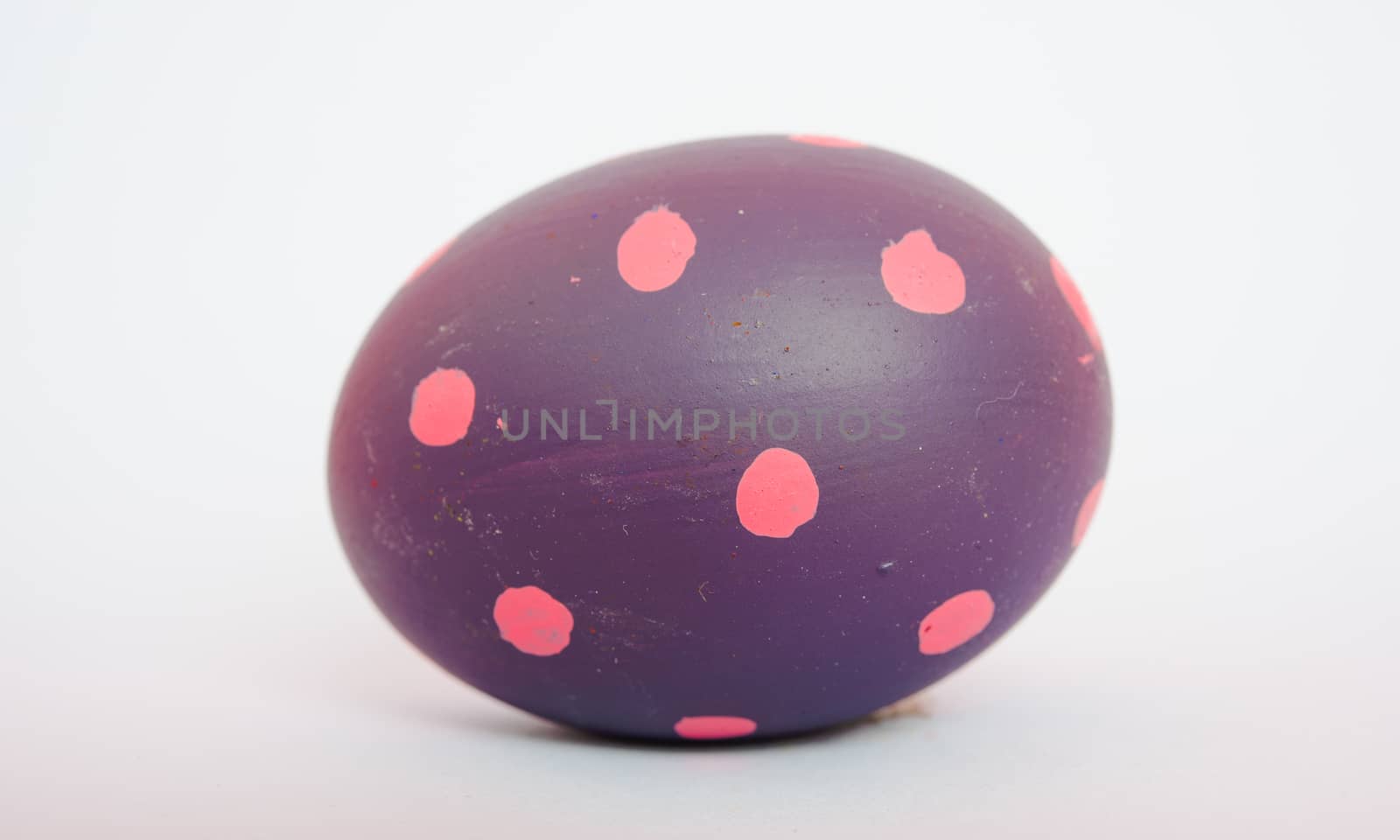 Beautiful Easter purple egg color isolate by Sorapop