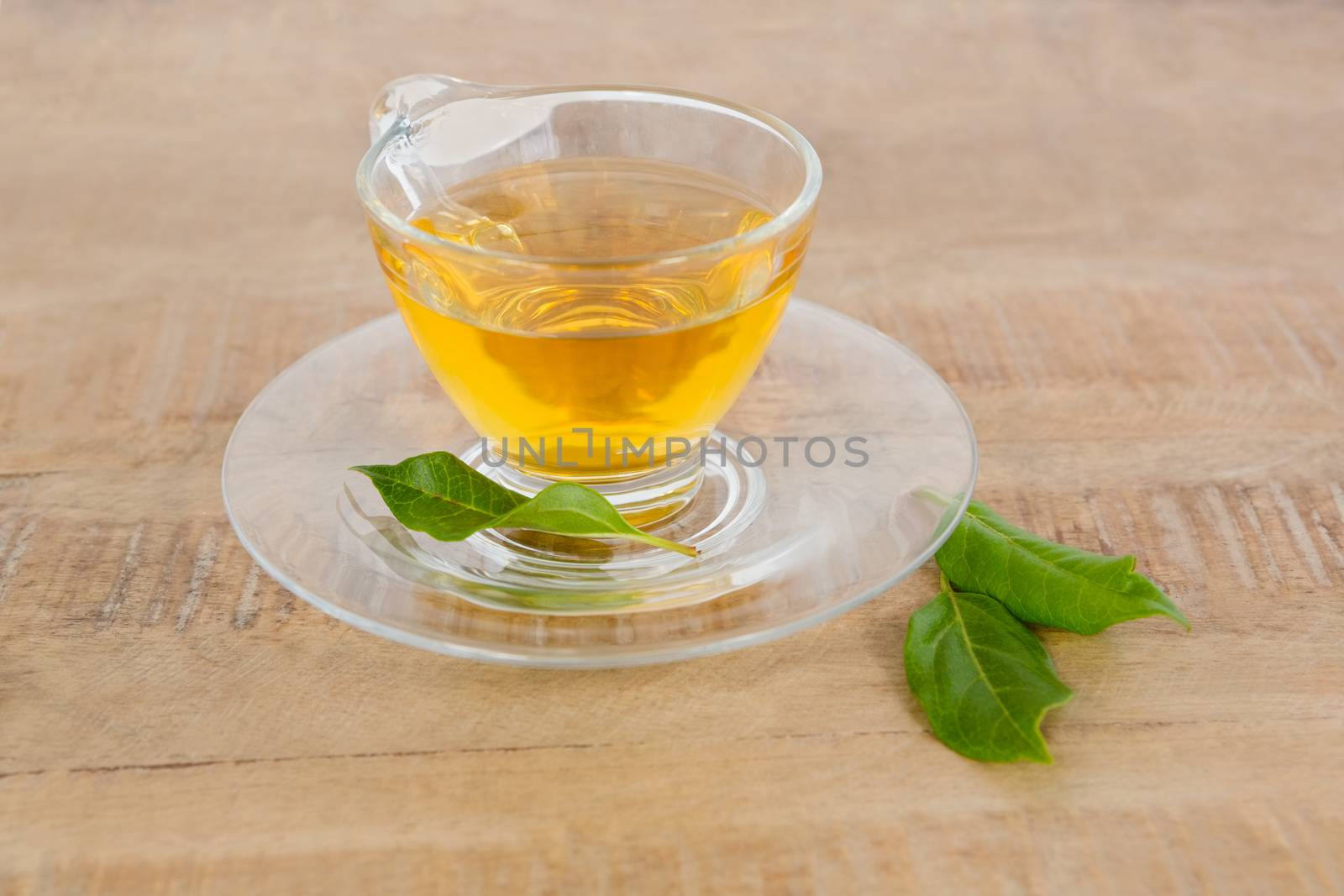 Green tea on table by Wavebreakmedia