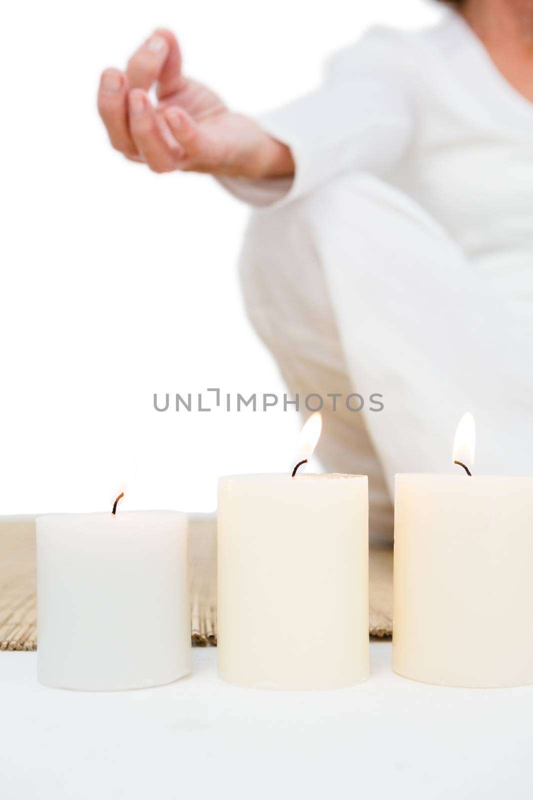 Cropped image of mature woman meditating  by Wavebreakmedia
