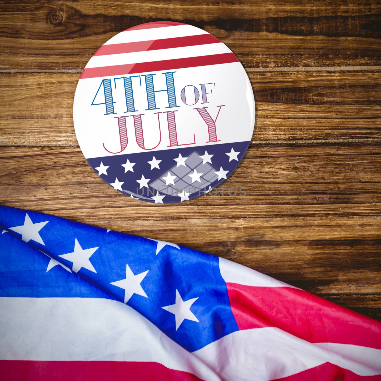 American flag button against usa flag on table