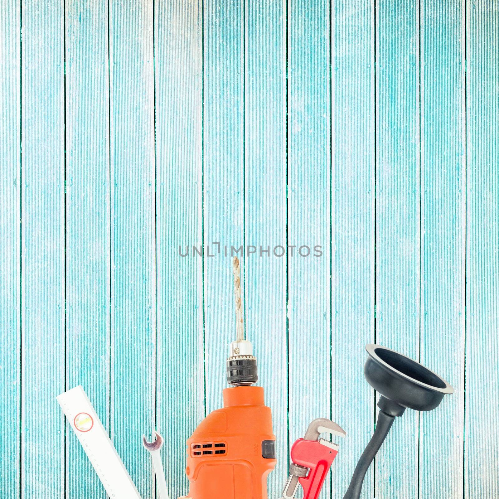 Tools on wooden background