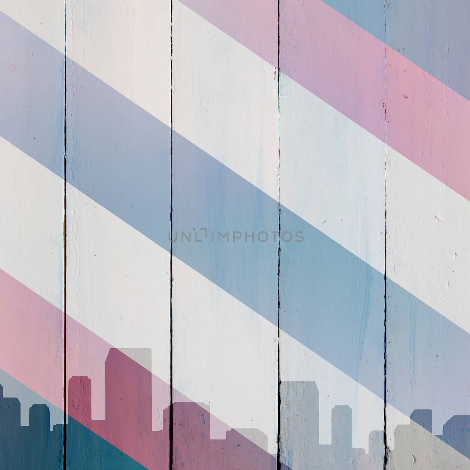 Silhouette cityscape against colored background