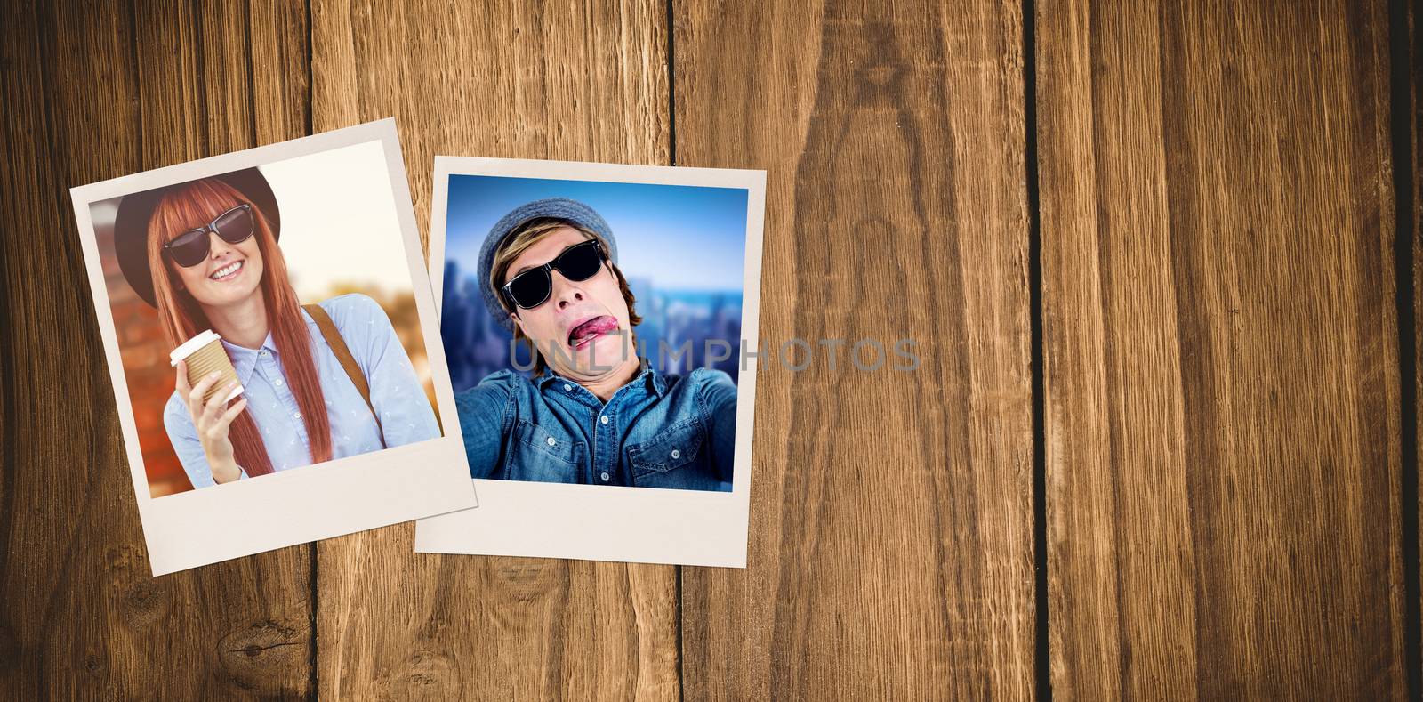 Smiling hipster woman drinking coffee against wooden table