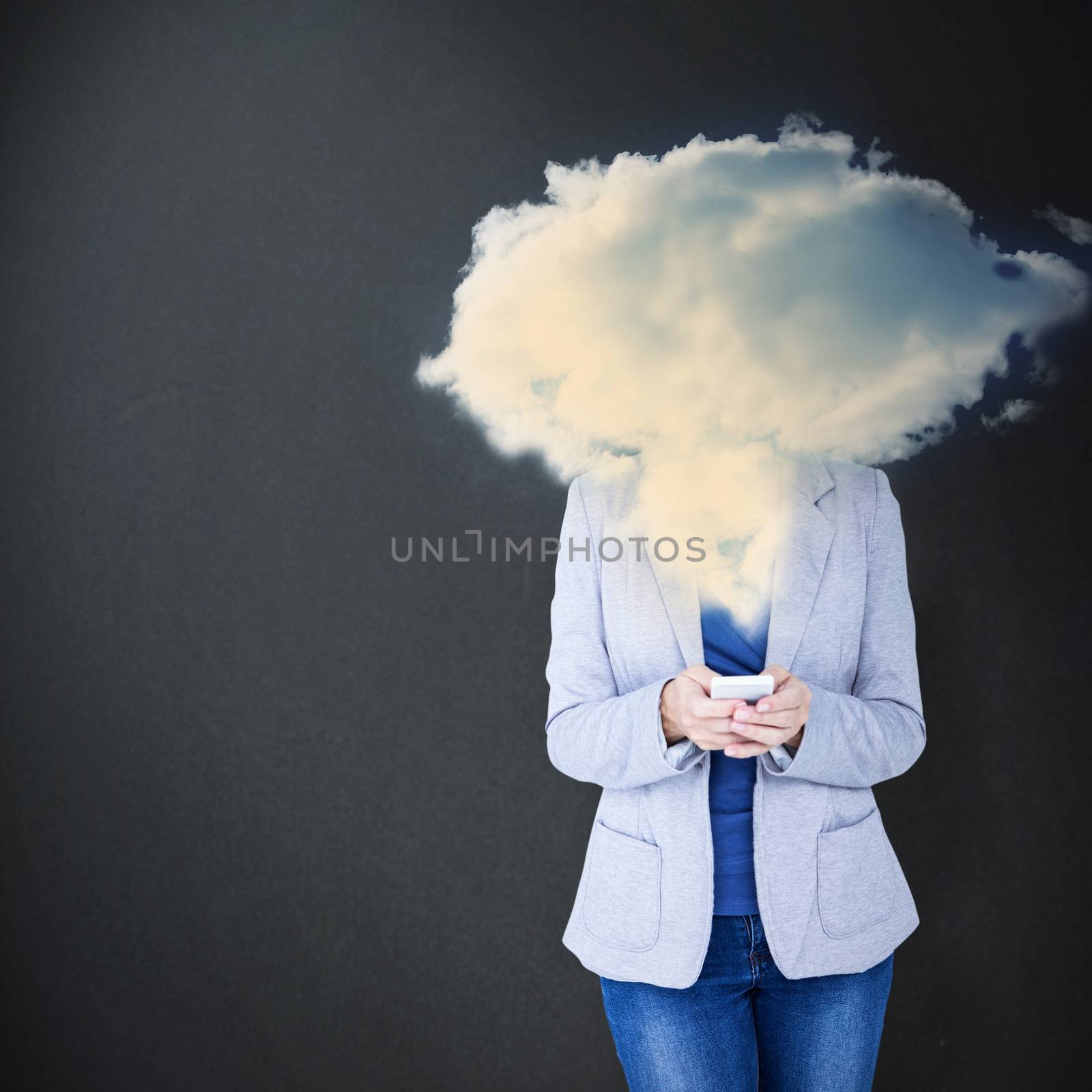 Portrait of smiling businesswoman using mobile phone against white background with vignette