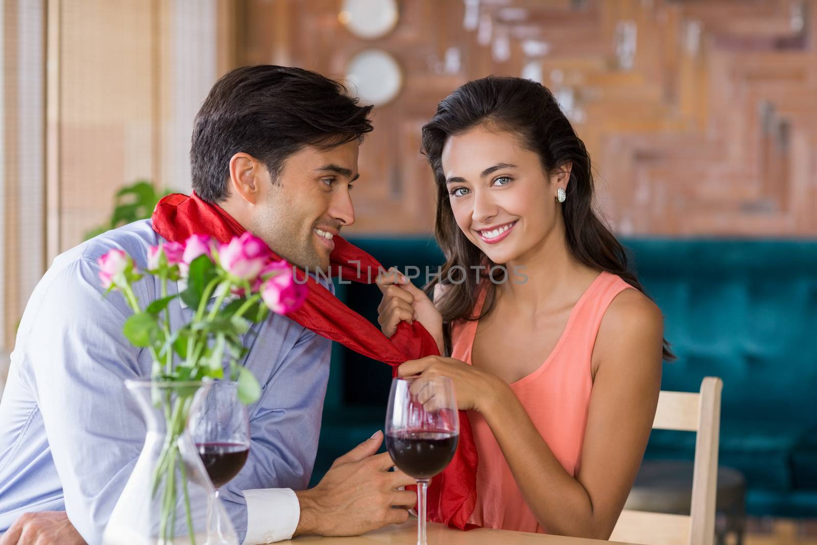 Romantic couple having fun together in restaurant