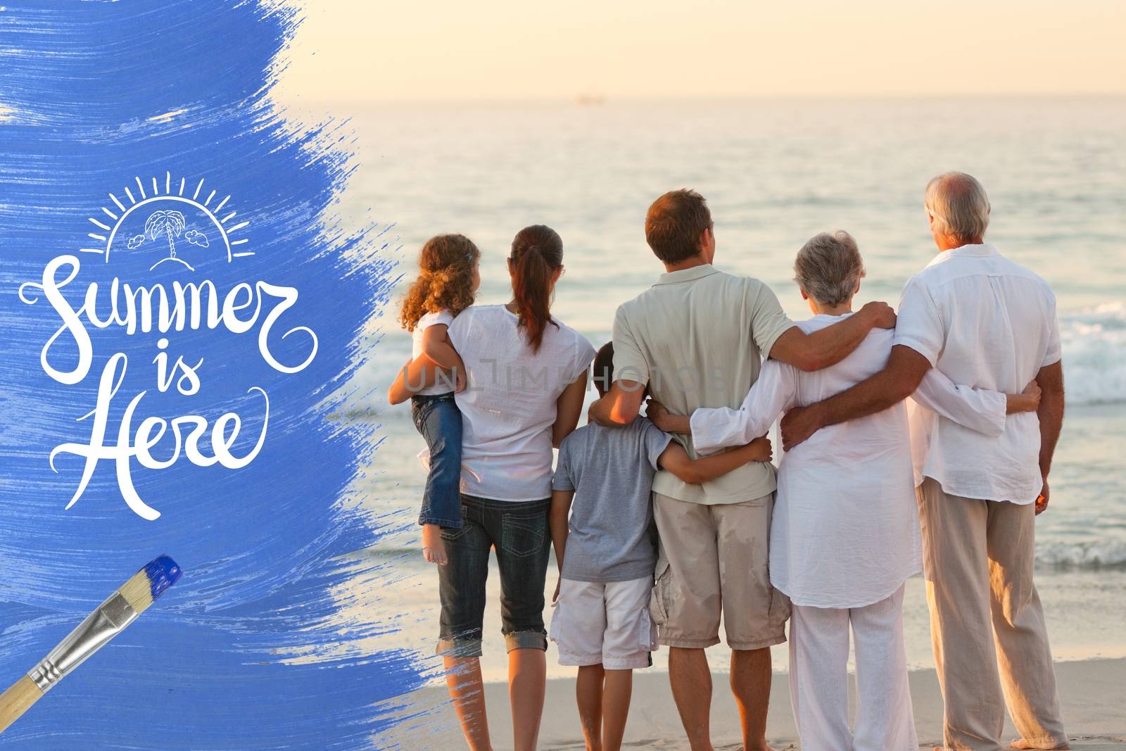 Extended family hugging at the beach by Wavebreakmedia