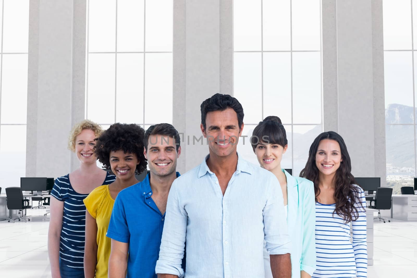 Smiling business people standing in the office