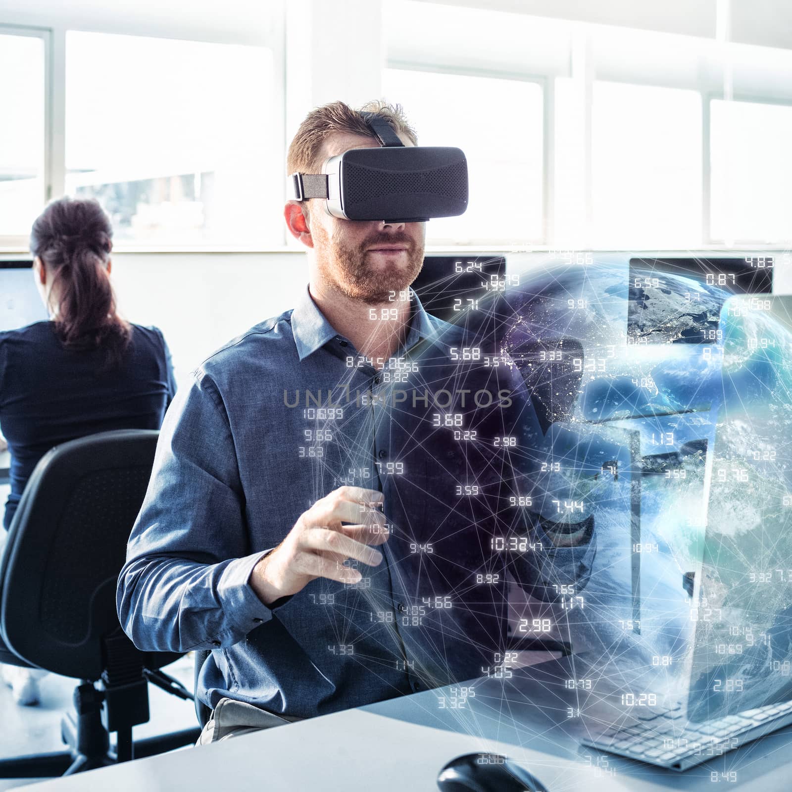 Earth globe against businessman wearing virtual reality simulator 