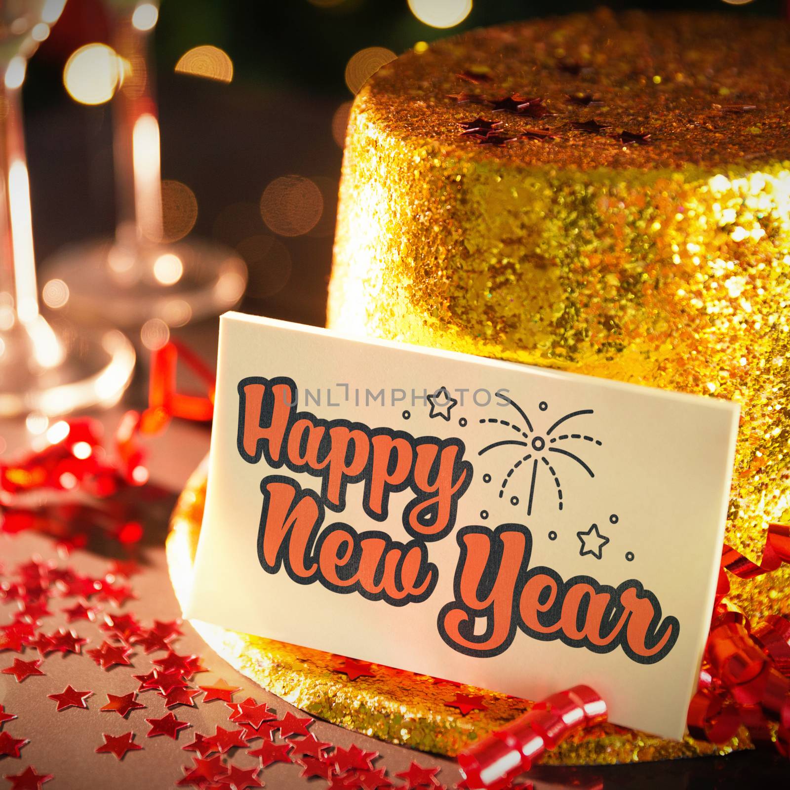  Digital composite of Happy new year card leaning on gold party hat