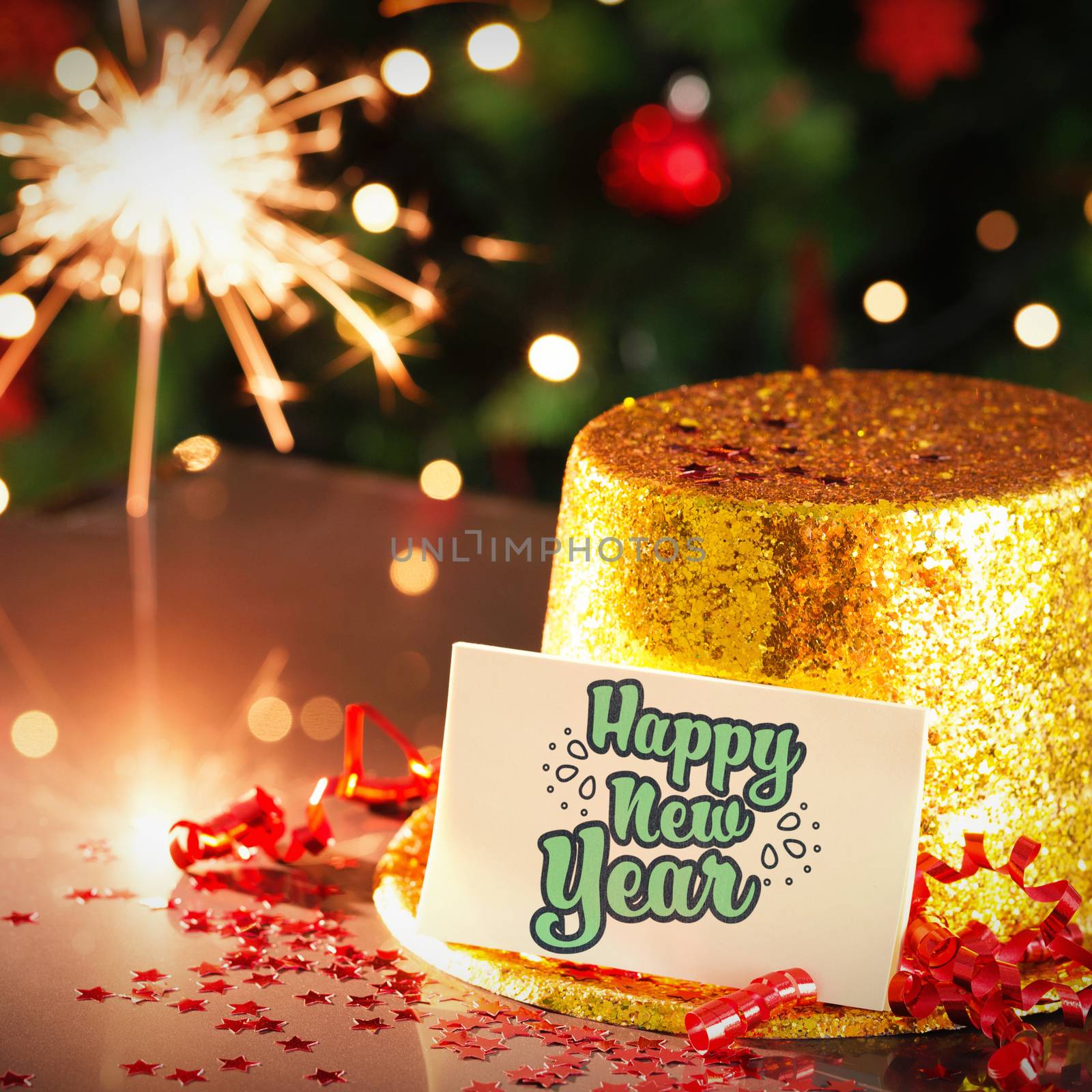  Digital composite of Happy new year card leaning on gold party hat