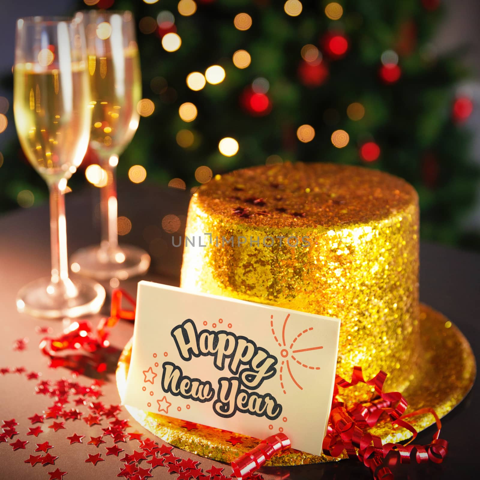  Digital composite of Happy new year card leaning on gold party hat