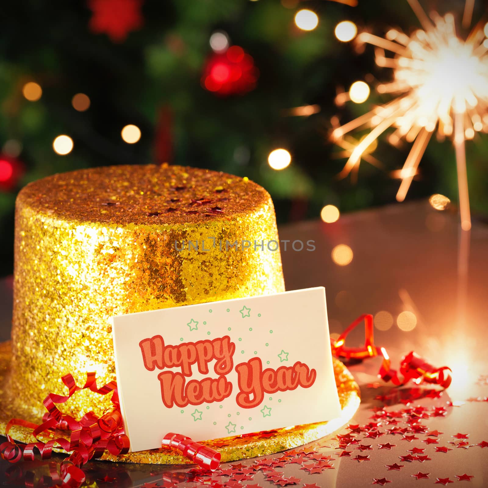 Digital composite of Happy new year card leaning on gold party hat