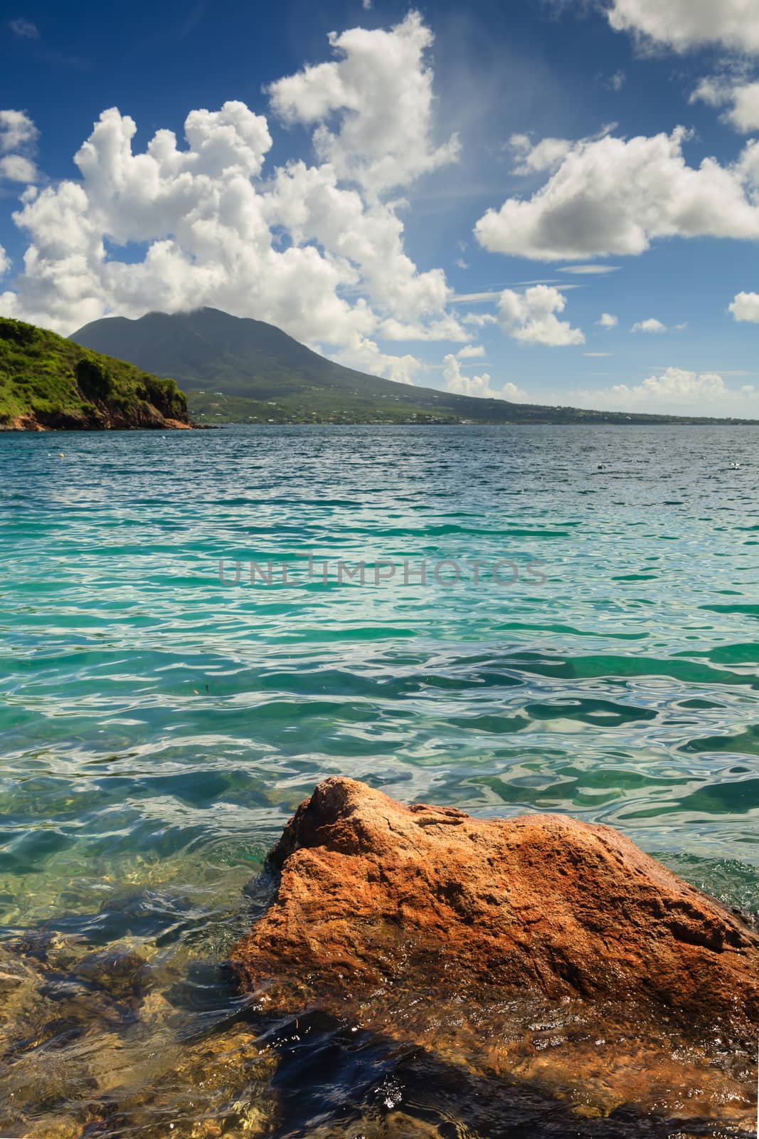 The view from Cockleshell Bay on the Caribbean island of St. Kitts in the West Indies.  The island of Nevis can be seen in the background.