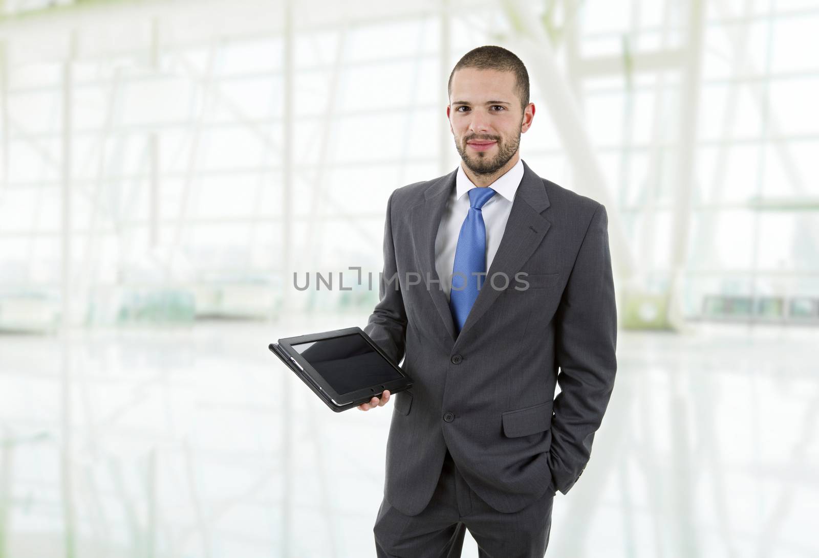 young businessman with a tablet pc, at the office