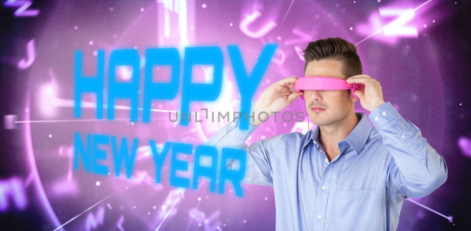 Composite image of man using pink virtual video glasses by Wavebreakmedia